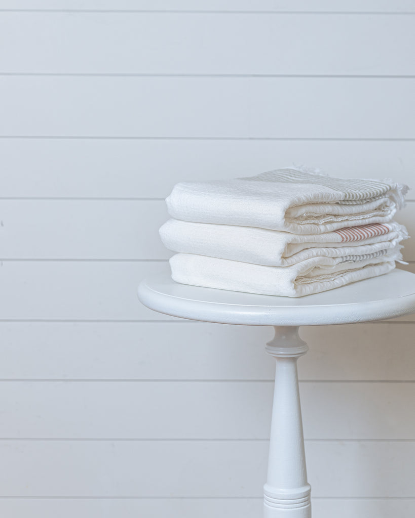 Ivory Turkish cotton waffle towels folded neatly