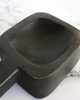 Handcrafted black mango wood serving dish with carved handle, rustic finish